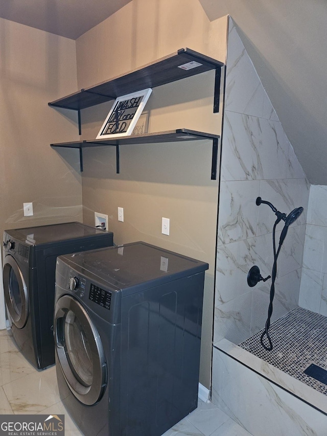 536 Longwood Pl, Dallas, GA 30132 - washroom with light marble finish floors and washer and clothes dryer
