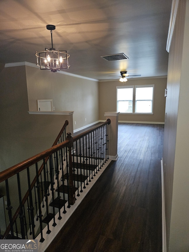 536 Longwood Pl, Dallas, GA 30132 - stairs featuring ornamental molding, wood finished floors, a chandelier, and baseboards