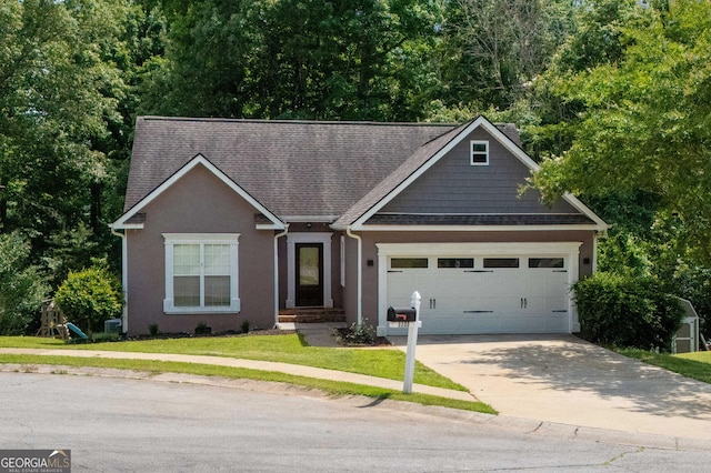 1133 Stone Brook Ln, Bremen, GA 30110 - view of front of property featuring driveway, an attached garage, a front yard, roof with shingles, and view of scattered trees