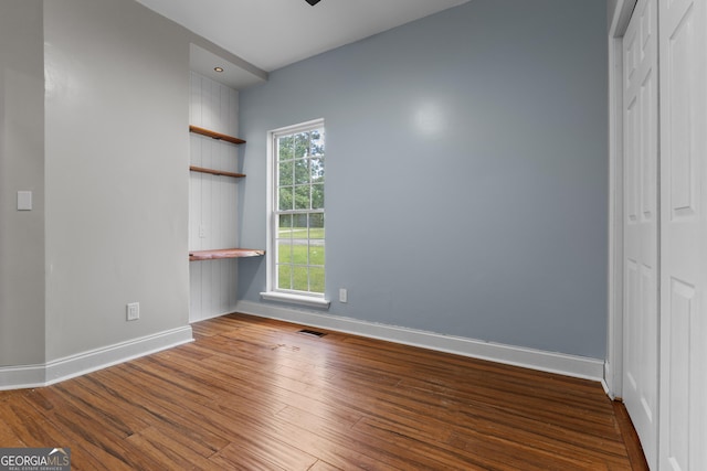 1133 Stone Brook Ln, Bremen, GA 30110 - unfurnished bedroom featuring baseboards, wood finished floors, and a closet