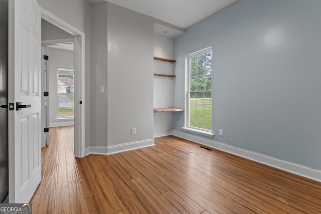 1133 Stone Brook Ln, Bremen, GA 30110 - empty room with wood finished floors and baseboards