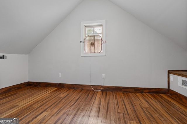 1133 Stone Brook Ln, Bremen, GA 30110 - bonus room with hardwood / wood-style floors, vaulted ceiling, and baseboards