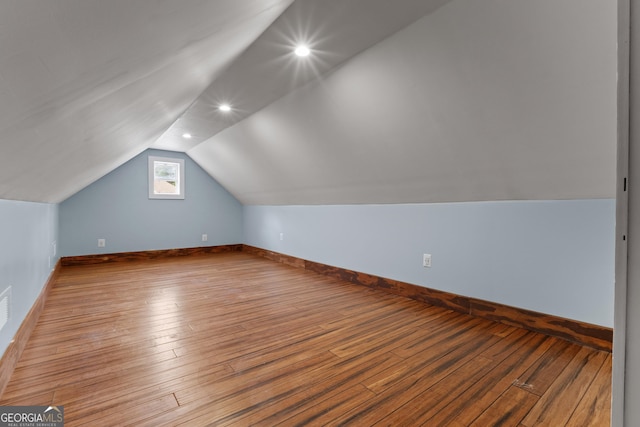 1133 Stone Brook Ln, Bremen, GA 30110 - bonus room featuring lofted ceiling, hardwood / wood-style flooring, baseboards, and recessed lighting
