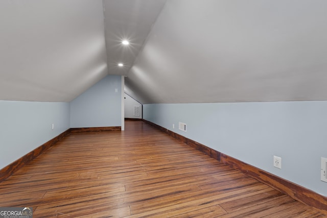 1133 Stone Brook Ln, Bremen, GA 30110 - additional living space with vaulted ceiling, wood finished floors, baseboards, and recessed lighting