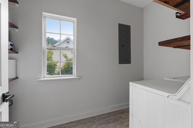 1133 Stone Brook Ln, Bremen, GA 30110 - laundry area with electric panel, healthy amount of natural light, baseboards, and light wood-type flooring