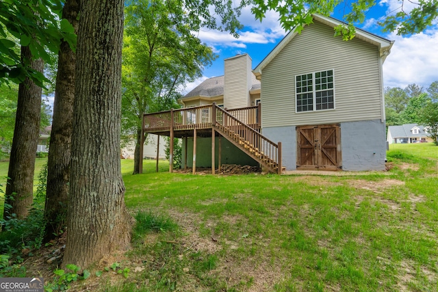 1133 Stone Brook Ln, Bremen, GA 30110 - back of property featuring a wooden deck, stairs, and a yard