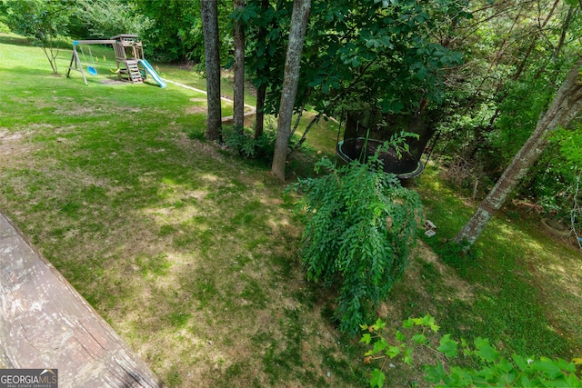 1133 Stone Brook Ln, Bremen, GA 30110 - view of green lawn featuring a playground