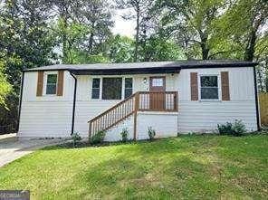 2190 Gordon Cir SE, Smyrna, GA 30080 - view of front of property with a front lawn