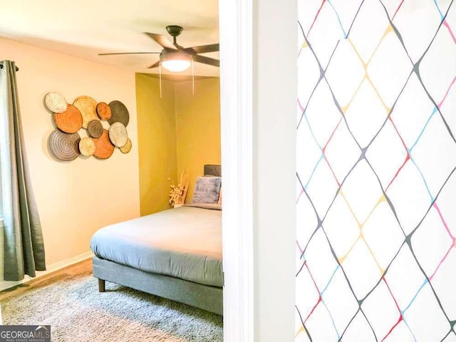 2190 Gordon Cir SE, Smyrna, GA 30080 - bedroom featuring ceiling fan and baseboards