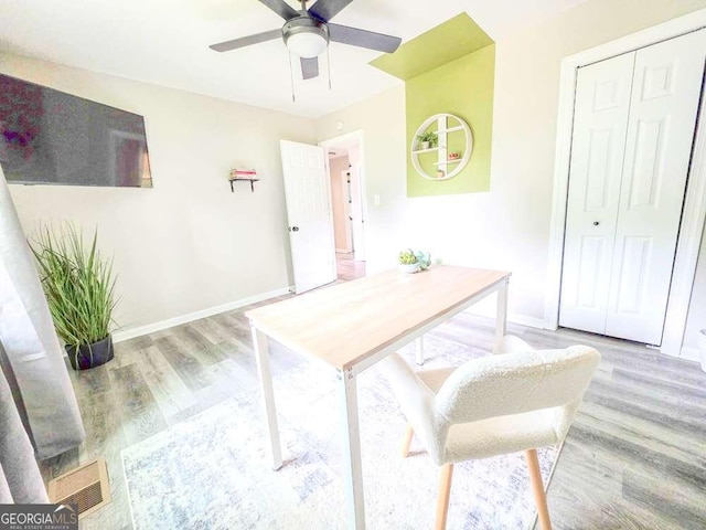 2190 Gordon Cir SE, Smyrna, GA 30080 - home office featuring wood finished floors, a ceiling fan, and baseboards
