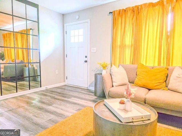 2190 Gordon Cir SE, Smyrna, GA 30080 - living area featuring wood finished floors and baseboards