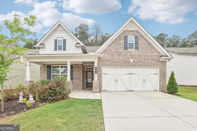 160 Amherst Way, Fayetteville, GA 30215 - view of front of house featuring brick siding, driveway, a front yard, and covered porch