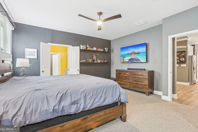 160 Amherst Way, Fayetteville, GA 30215 - carpeted bedroom with baseboards, ceiling fan, and stainless steel fridge with ice dispenser