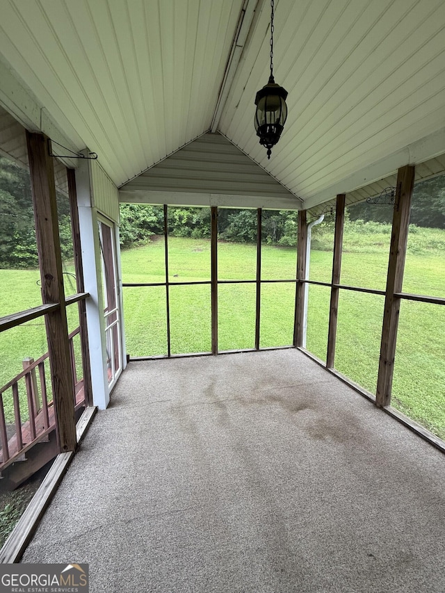 650 Flippen Rd, Stockbridge, GA 30281 - unfurnished sunroom with lofted ceiling