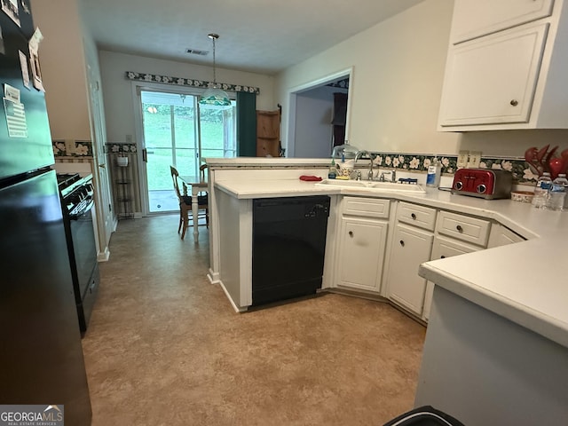650 Flippen Rd, Stockbridge, GA 30281 - kitchen with dishwasher, gas range oven, white cabinetry, freestanding refrigerator, and light countertops
