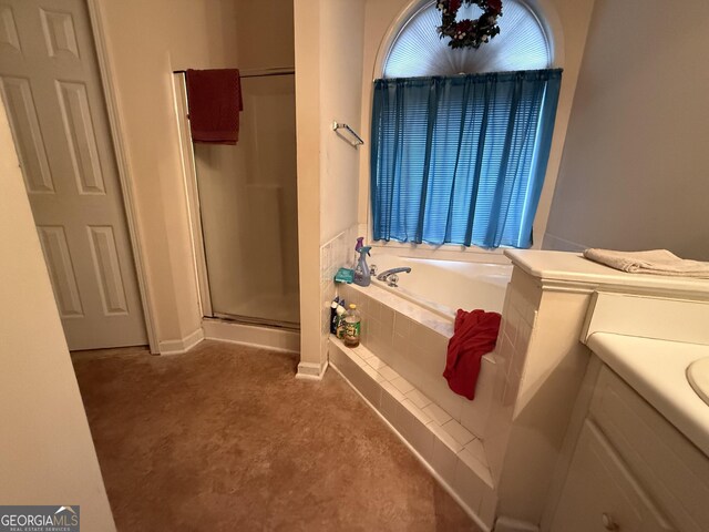 650 Flippen Rd, Stockbridge, GA 30281 - bathroom featuring a bath and a stall shower