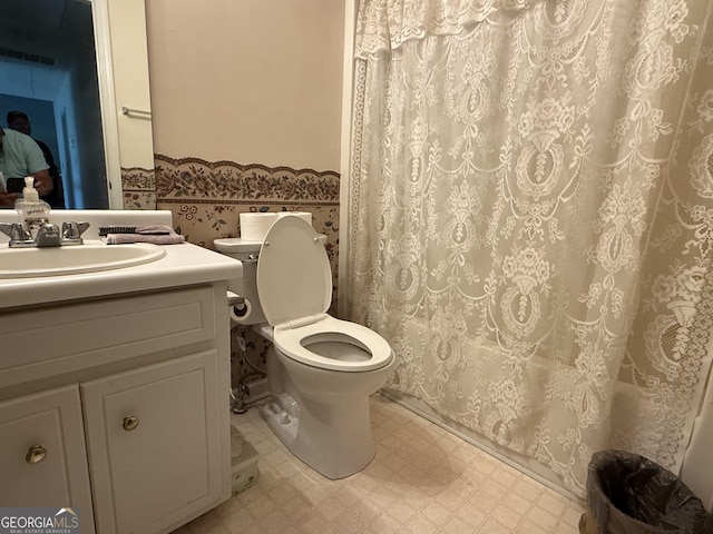 650 Flippen Rd, Stockbridge, GA 30281 - bathroom featuring tile patterned floors, vanity, wallpapered walls, and a shower with curtain