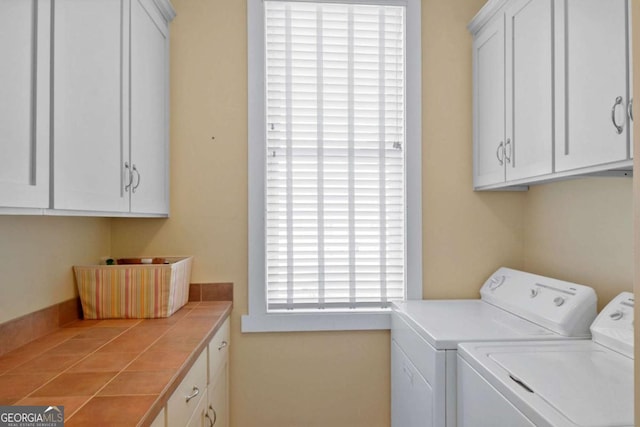 180 Shadow Wood Bnd, Saint Simons, GA 31522 - laundry room featuring washer and dryer and cabinet space