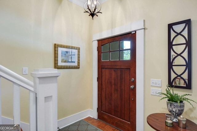 180 Shadow Wood Bnd, Saint Simons, GA 31522 - entryway featuring baseboards and wood finished floors
