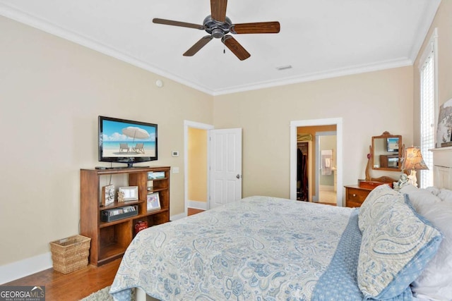 180 Shadow Wood Bnd, Saint Simons, GA 31522 - bedroom featuring wood finished floors, ornamental molding, and a ceiling fan