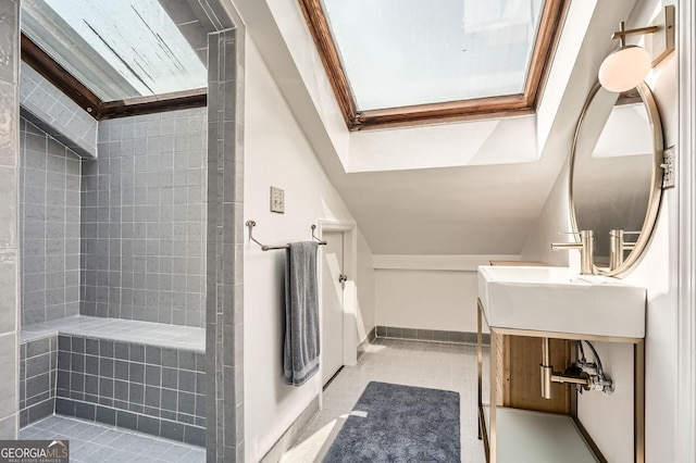 1078 Piedmont Ave NE Unit 206, Atlanta, GA 30309 - full bathroom with a skylight, a tile shower, vanity, and tile patterned floors