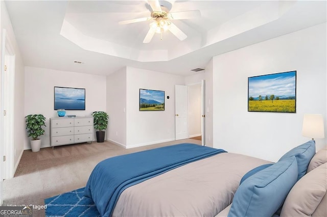 2330 Springmonte Pl, Cumming, GA 30041 - bedroom with a raised ceiling, carpet floors, baseboards, and a ceiling fan