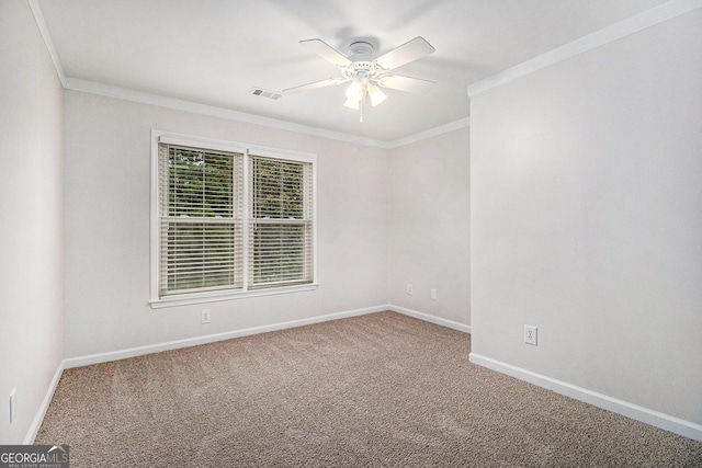 2330 Springmonte Pl, Cumming, GA 30041 - spare room with ornamental molding, a ceiling fan, carpet, and baseboards