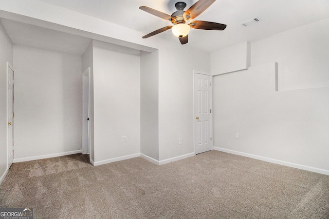 2330 Springmonte Pl, Cumming, GA 30041 - unfurnished bedroom featuring carpet flooring, baseboards, and ceiling fan