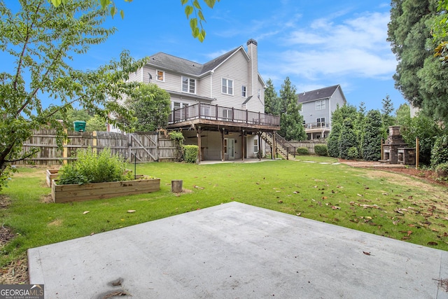 2330 Springmonte Pl, Cumming, GA 30041 - rear view of property featuring a vegetable garden, a patio, a deck, a chimney, and stairs
