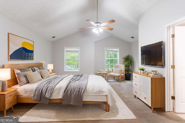541 Shadow Valley Ct, Lithonia, GA 30058 - bedroom with light colored carpet, vaulted ceiling, and ceiling fan