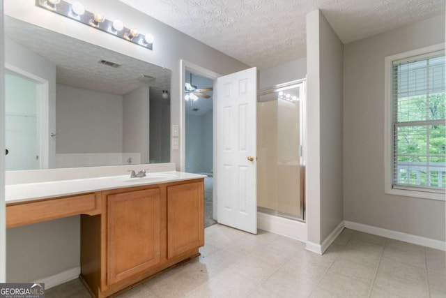 541 Shadow Valley Ct, Lithonia, GA 30058 - bathroom featuring vanity, baseboards, a shower stall, a textured ceiling, and ceiling fan