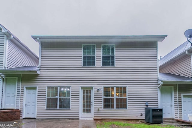 541 Shadow Valley Ct, Lithonia, GA 30058 - rear view of property with cooling unit and a patio