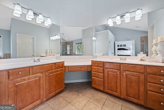 514 Augusta Dr, Canton, GA 30115 - ensuite bathroom with lofted ceiling, tile patterned flooring, vanity, and a stall shower