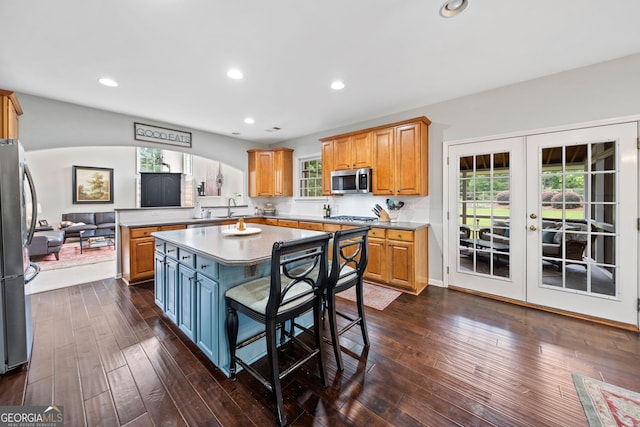 514 Augusta Dr, Canton, GA 30115 - kitchen with stainless steel appliances, french doors, a kitchen island, dark wood-type flooring, and recessed lighting