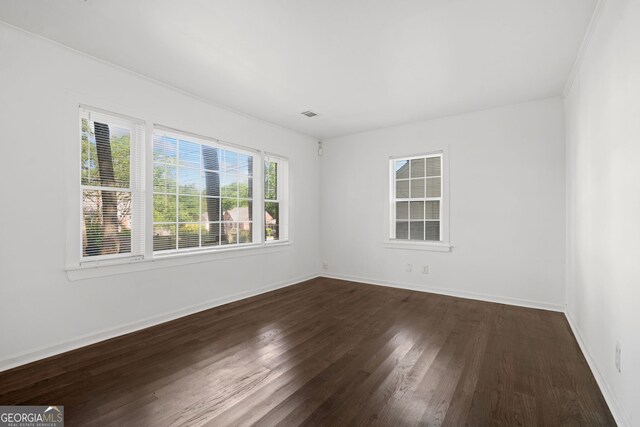 1844 Stanton St, Decatur, GA 30032 - spare room with dark wood-type flooring and baseboards