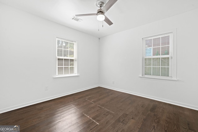 1844 Stanton St, Decatur, GA 30032 - spare room with ceiling fan, dark wood-style flooring, and baseboards