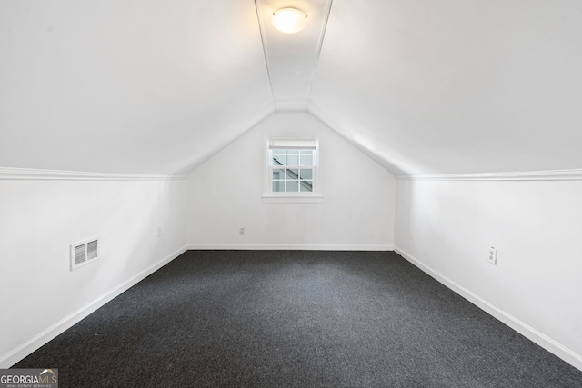 1844 Stanton St, Decatur, GA 30032 - bonus room featuring lofted ceiling, baseboards, and dark colored carpet