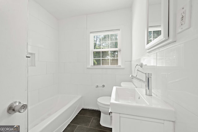 1844 Stanton St, Decatur, GA 30032 - full bathroom featuring tile patterned floors, toilet, vanity, and  shower combination