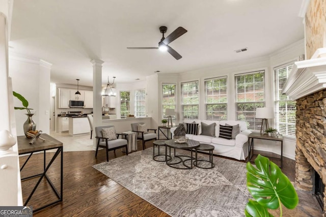 5860 Fairway View Dr, Suwanee, GA 30024 - living room with crown molding, a ceiling fan, and light wood-style floors
