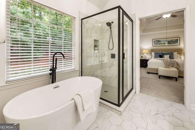 5860 Fairway View Dr, Suwanee, GA 30024 - ensuite bathroom featuring plenty of natural light, a soaking tub, a stall shower, and tile patterned floors