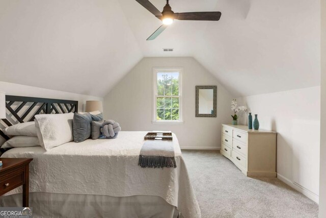 5860 Fairway View Dr, Suwanee, GA 30024 - bedroom featuring light carpet, lofted ceiling, and a ceiling fan