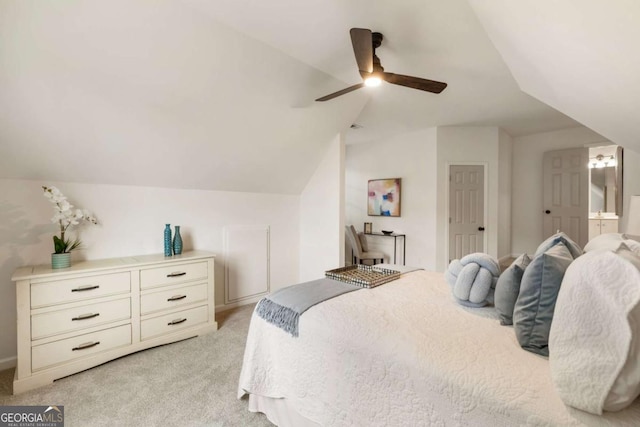 5860 Fairway View Dr, Suwanee, GA 30024 - bedroom featuring vaulted ceiling, light colored carpet, ensuite bathroom, and ceiling fan