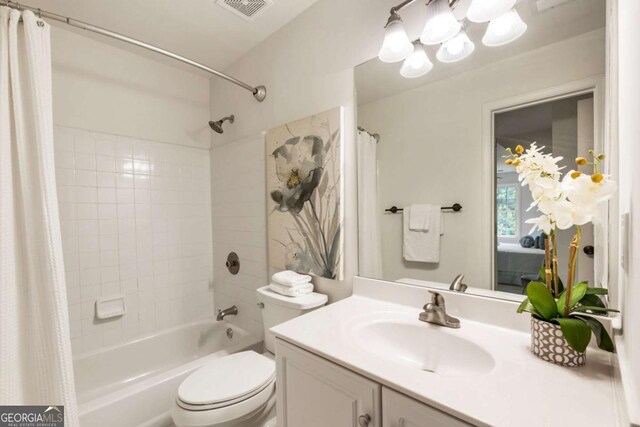 5860 Fairway View Dr, Suwanee, GA 30024 - bathroom with shower / tub combo with curtain, vanity, and a chandelier