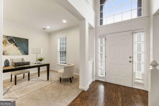 5860 Fairway View Dr, Suwanee, GA 30024 - entryway featuring ornamental molding, wood finished floors, carpet, and recessed lighting