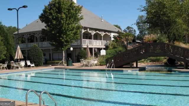 5860 Fairway View Dr, Suwanee, GA 30024 - community pool featuring stairway