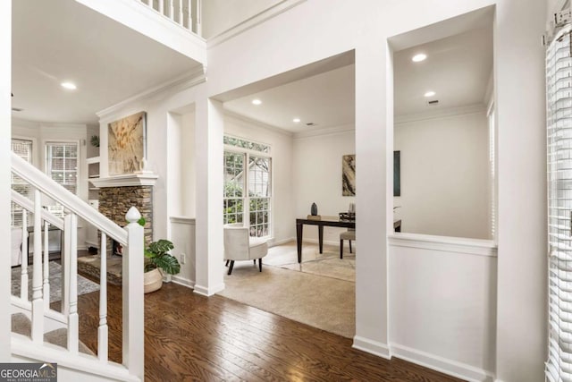 5860 Fairway View Dr, Suwanee, GA 30024 - entrance foyer featuring crown molding, wood finished floors, recessed lighting, a fireplace, and stairs