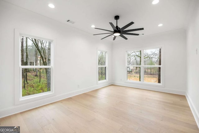 1050 Carnoustie, Greensboro, GA 30642 - empty room with recessed lighting, light wood-style flooring, and a ceiling fan