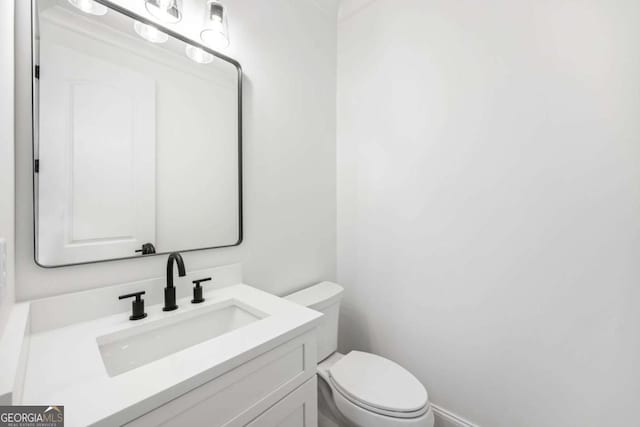 1050 Carnoustie, Greensboro, GA 30642 - bathroom with vanity and toilet