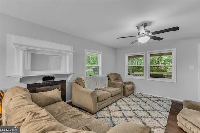 342 Chevis Rd, Savannah, GA 31419 - living room featuring ceiling fan, wood finished floors, and baseboards