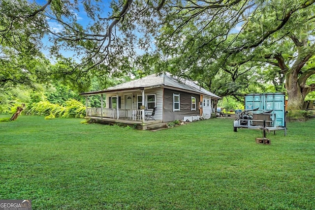 342 Chevis Rd, Savannah, GA 31419 - view of side of property featuring a yard and covered porch
